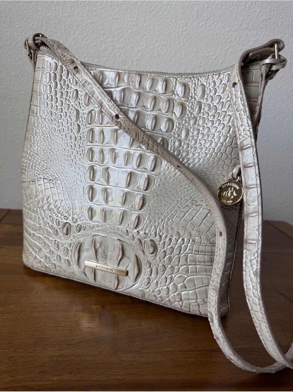 Brahmin Ivory Embossed Leather Crossbody Bag with matching wallet.